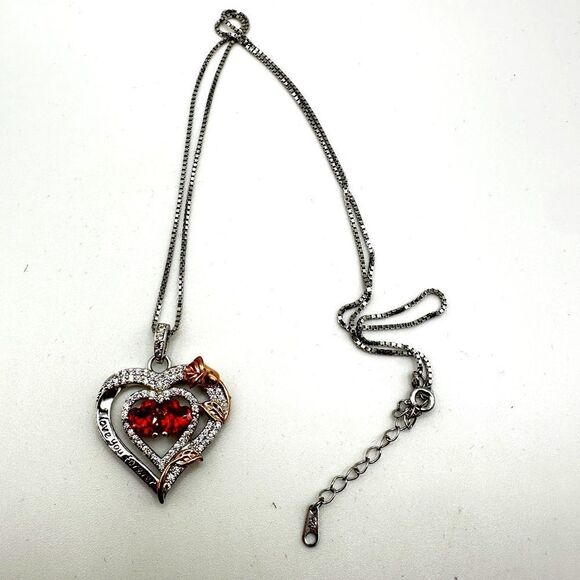 Jewelry - NIB Sterling silver, possibly gold plated, heart necklace with cz diamonds!